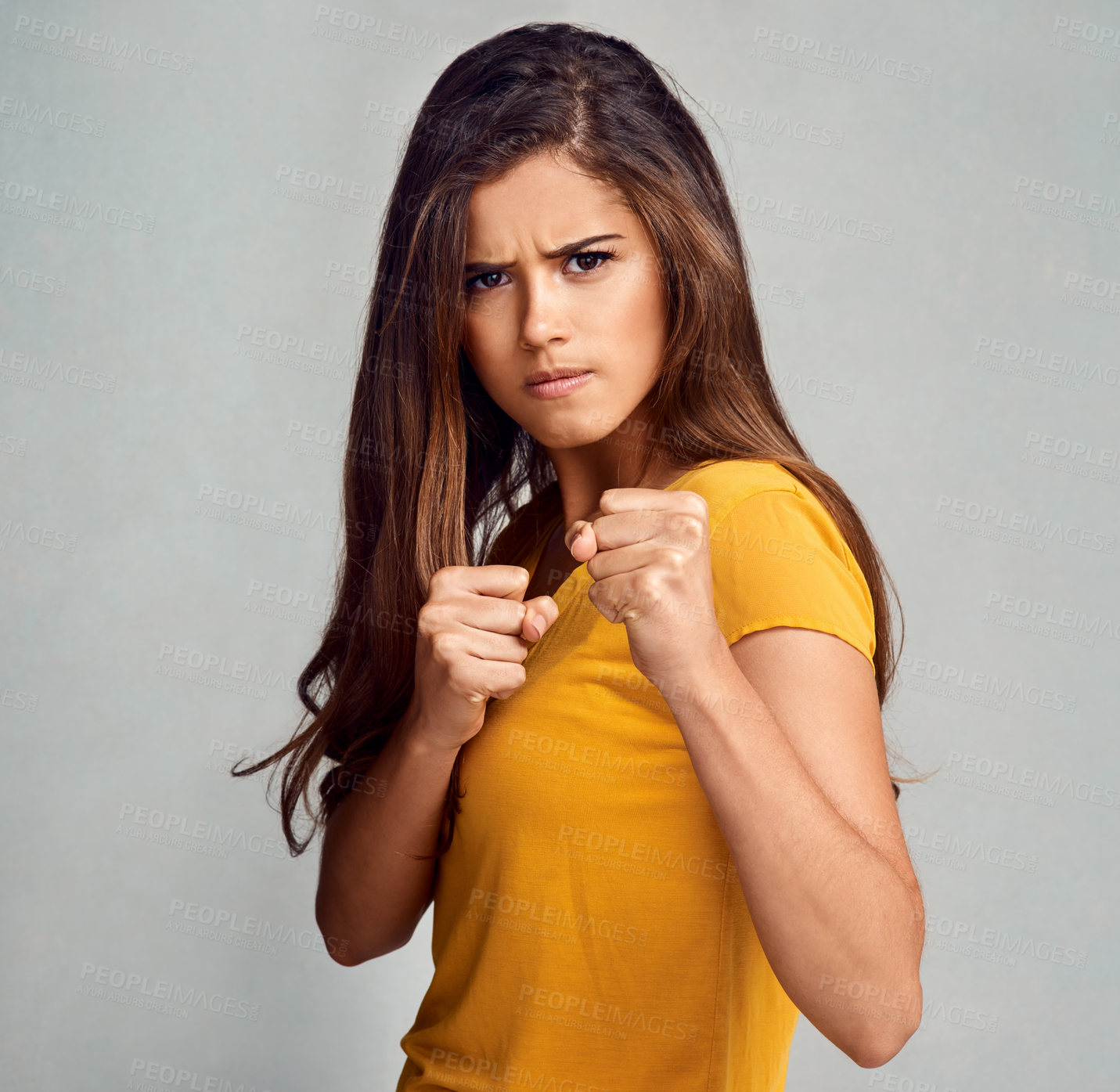 Buy stock photo Fist, angry and portrait of woman in studio for human rights, equality and female empowerment. Power, justice and person with gesture of fight for activism, strength and change on white background