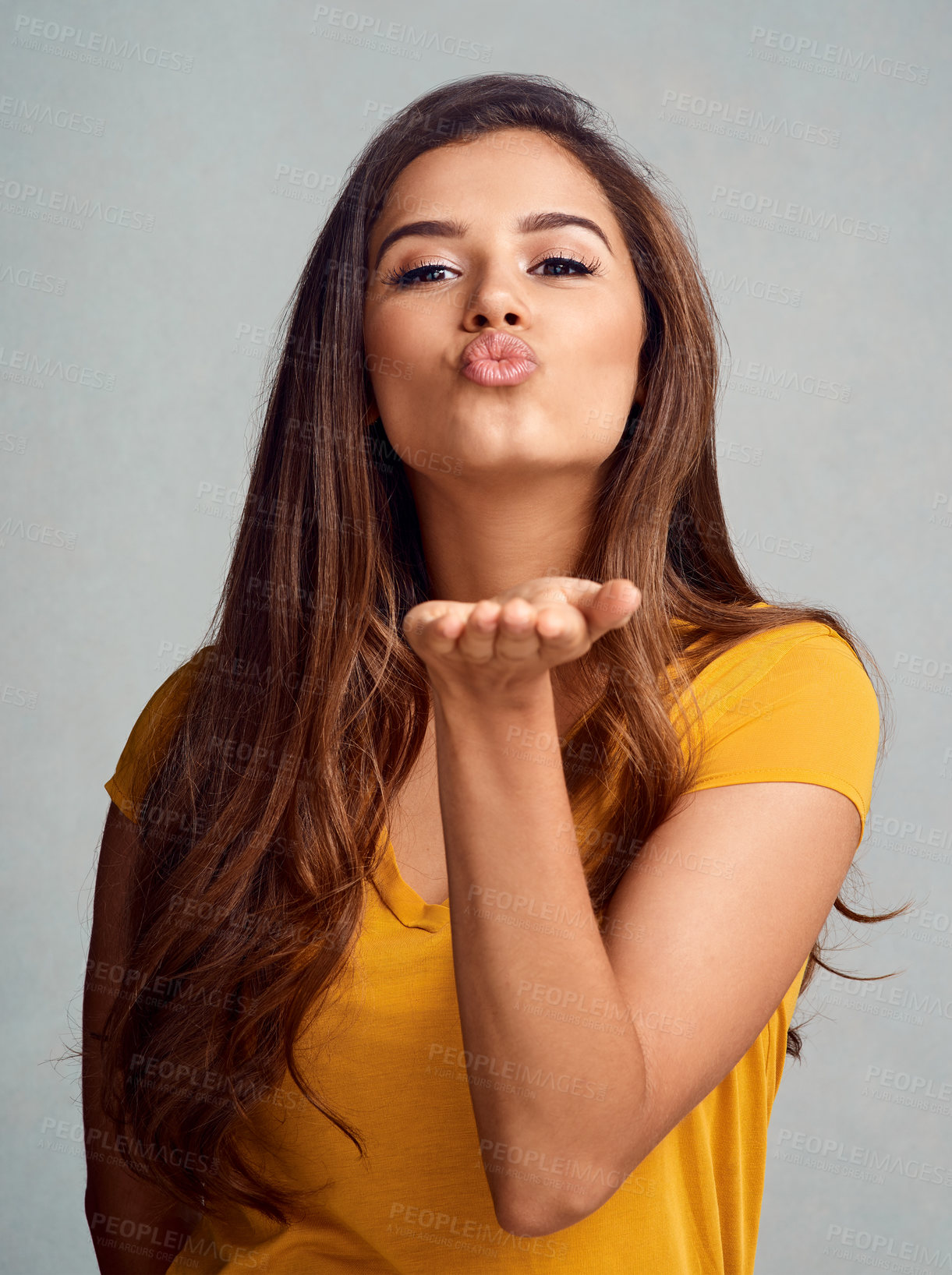 Buy stock photo Studio, portrait and woman with pout for kiss, flirting and playful with affection gesture for goodbye. Female model, blow and emoji reaction by gray background for romance, face expression and love