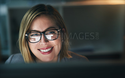 Buy stock photo Happy, businesswoman and working late on a computer or overtime for a project deadline or schedule and in an office. Research, email and corporate worker with smile or analysis and report at night