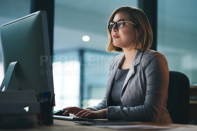 Buy stock photo Computer, typing and business woman in office working late on project at night alone. Desktop, professional and female person writing email, report or planning, reading and overtime for deadline.
