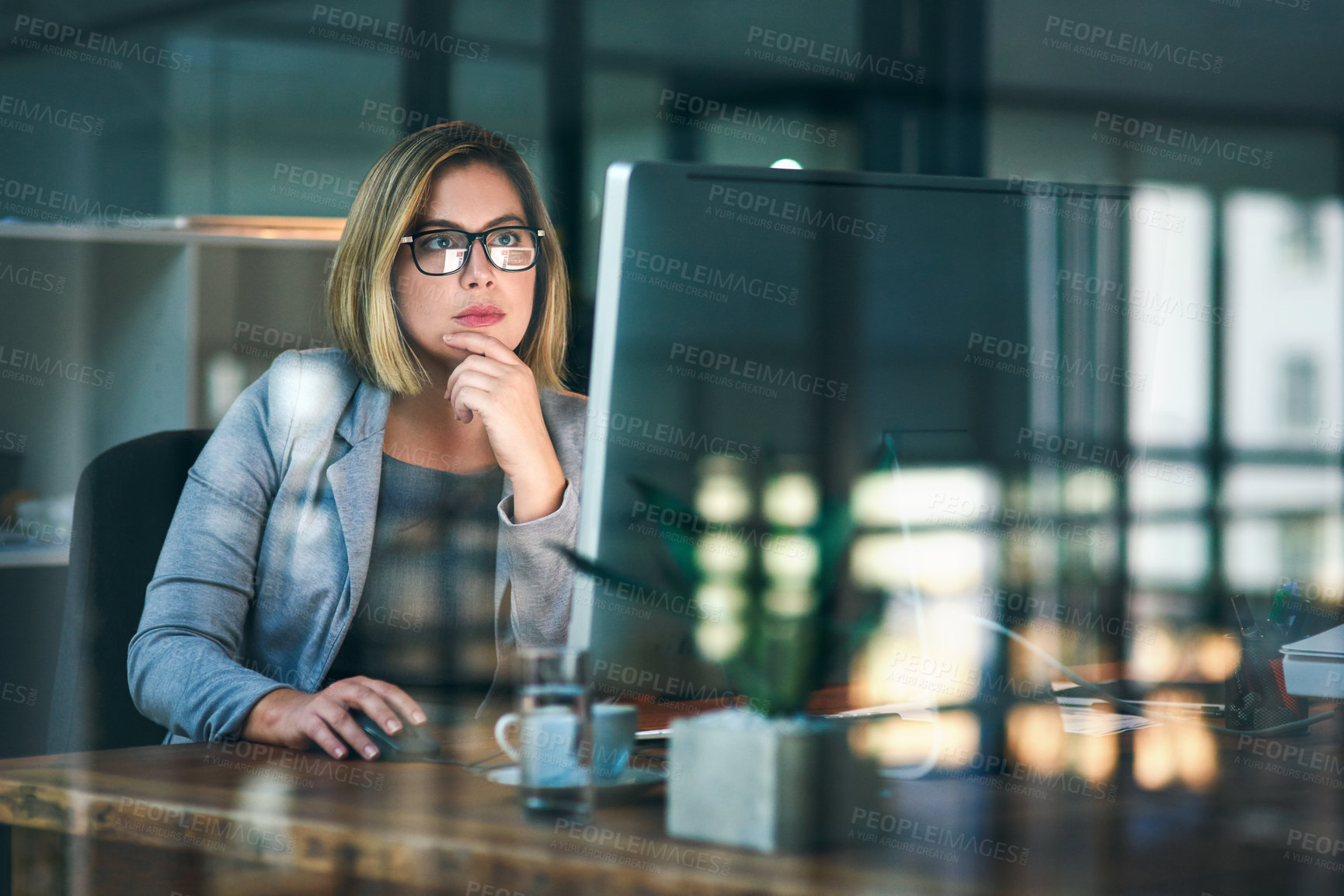 Buy stock photo Business woman, think and computer at night for reading email, planning and working on project in office. Professional, scroll and receptionist for administration, research deadline and information