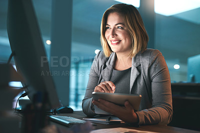 Buy stock photo Cropped shot of a young businesswoman working in her office late at night