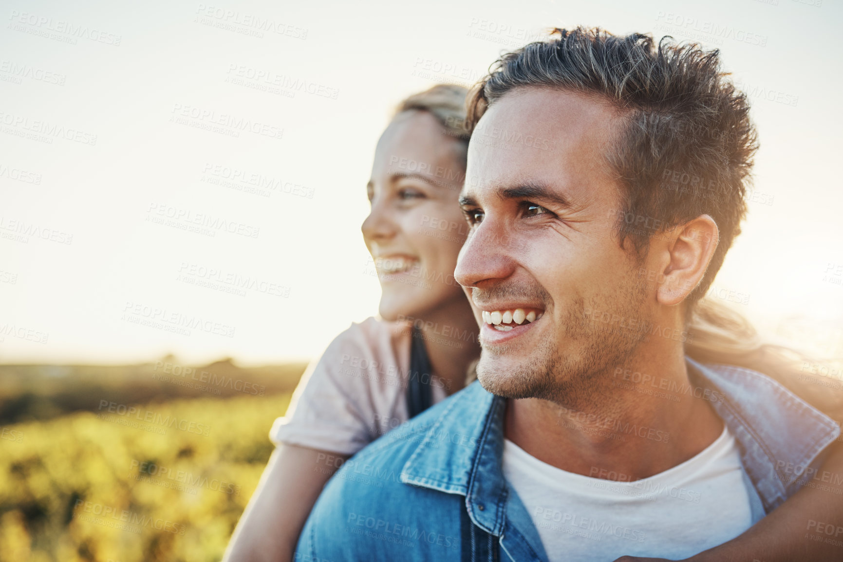 Buy stock photo Couple, piggyback and embrace in nature on farm for rural life, agriculture and sustainable people for agro industry. Man, woman and together with love on green land, countryside and commitment.