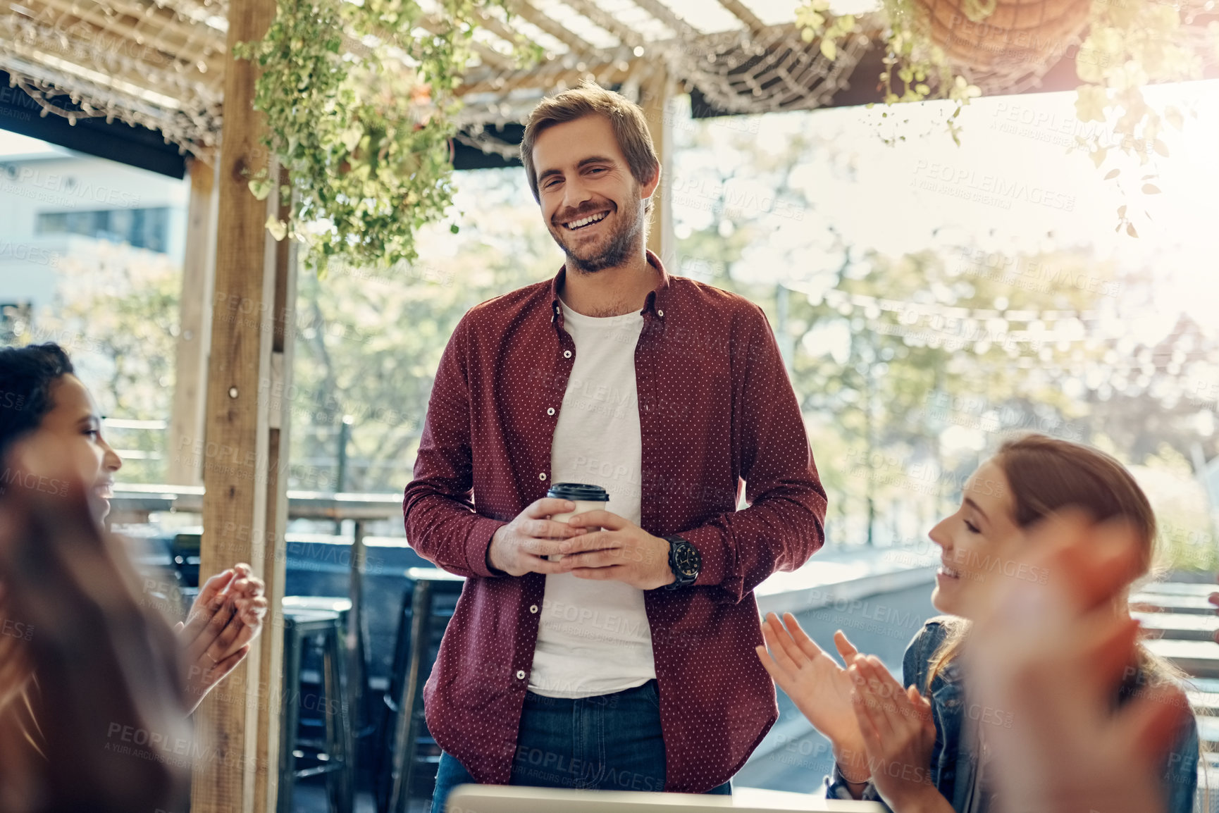 Buy stock photo Happy man, coffee and presentation with team or applause at cafe restaurant for meeting, discussion or thank you. Male person talking with smile or group clapping for congratulations at coffee shop