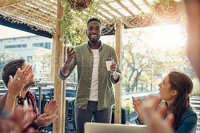 Buy stock photo Black man, coffee and presentation with applause for team building, meeting or discussion at outdoor cafe. Young African, male person or happy group of employees clapping for promotion at restaurant