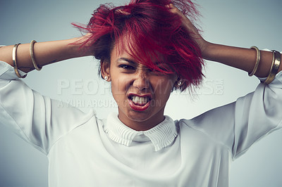 Buy stock photo Anger, frustrated and girl in studio holding head for trauma, mental health and stress or anxiety for crisis. Portrait of person with bipolar disorder, ptsd or psychological pain on white background