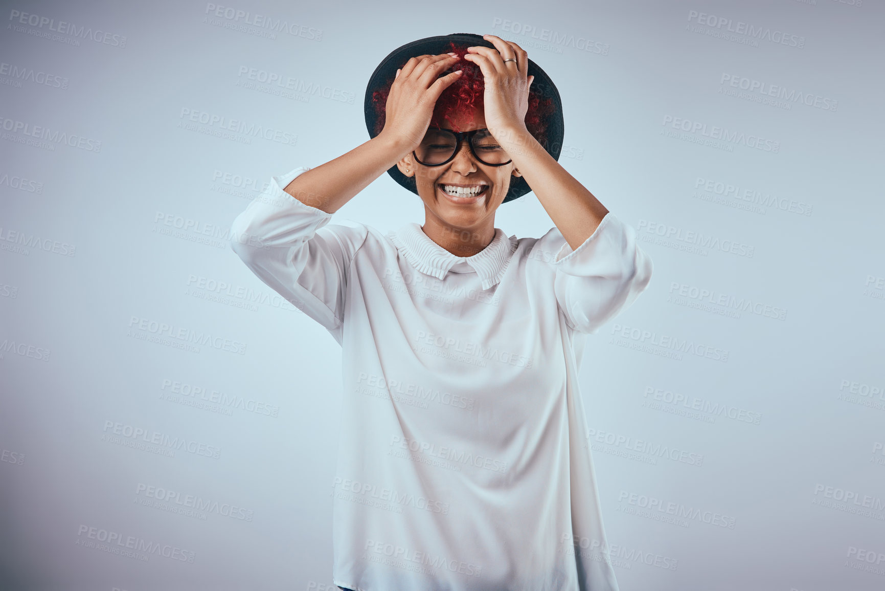 Buy stock photo Happy, woman and laughing from funny joke with hipster fashion and glasses in studio. Smile, trendy and silly mistake from epic fail with model eyewear and minimalist style in grey background