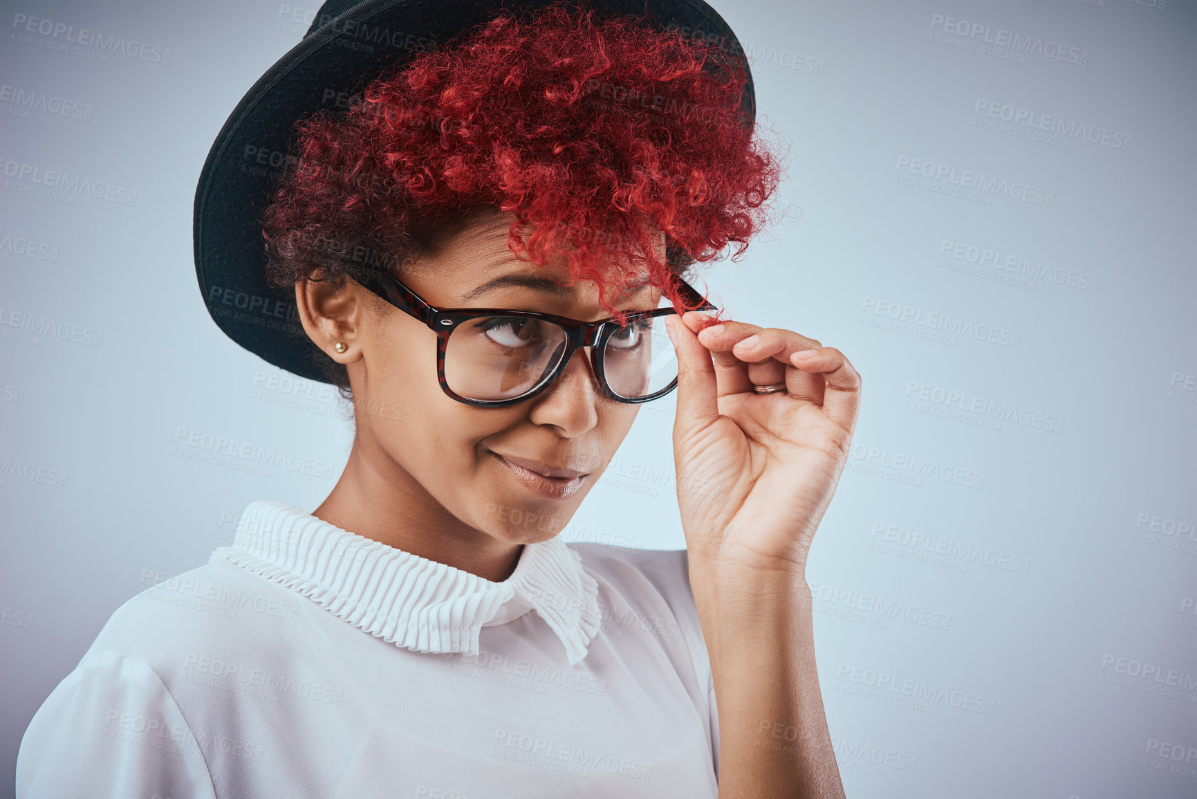 Buy stock photo African girl, hair and touching curls in studio for growth check, color choice or thinking of new style on white background. Young person with worry for frizz damage, red dye or health maintenance