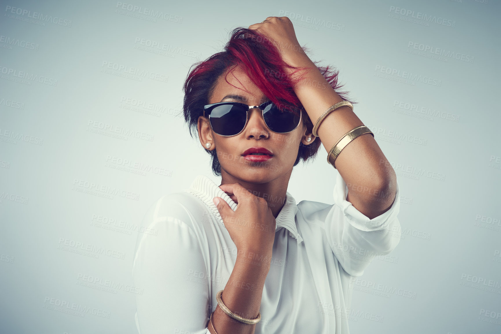 Buy stock photo Portrait, fashion and woman with sunglasses, confidence and person on gray studio background. Face, model and girl with stylish clothes, hair dye and mockup space with pride, punk rock and gen z