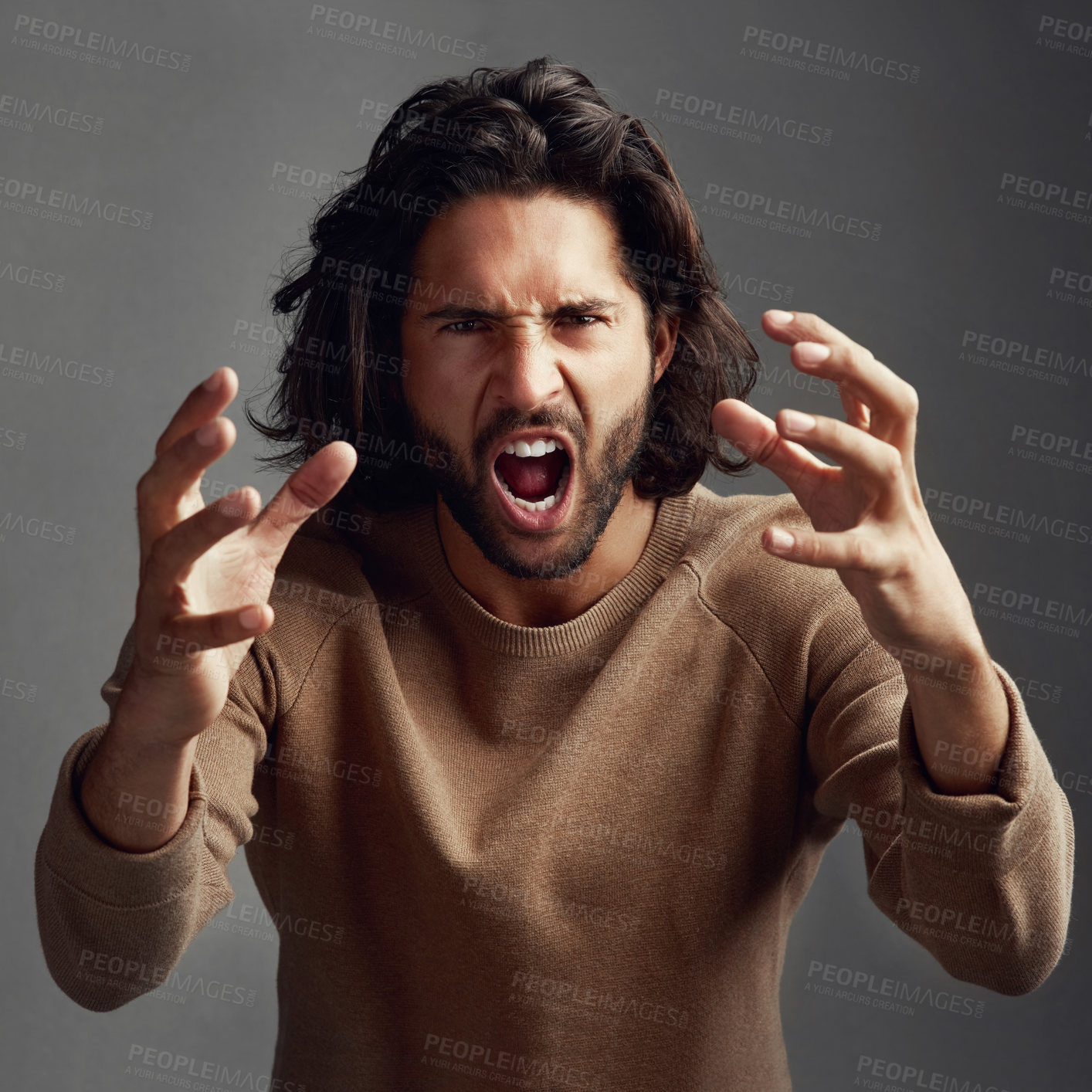 Buy stock photo Anxiety, anger and screaming with creative man in studio for headache, stress and burnout. Mental health, frustrated and fear with male model on grey background for fatigue, mistake and expression