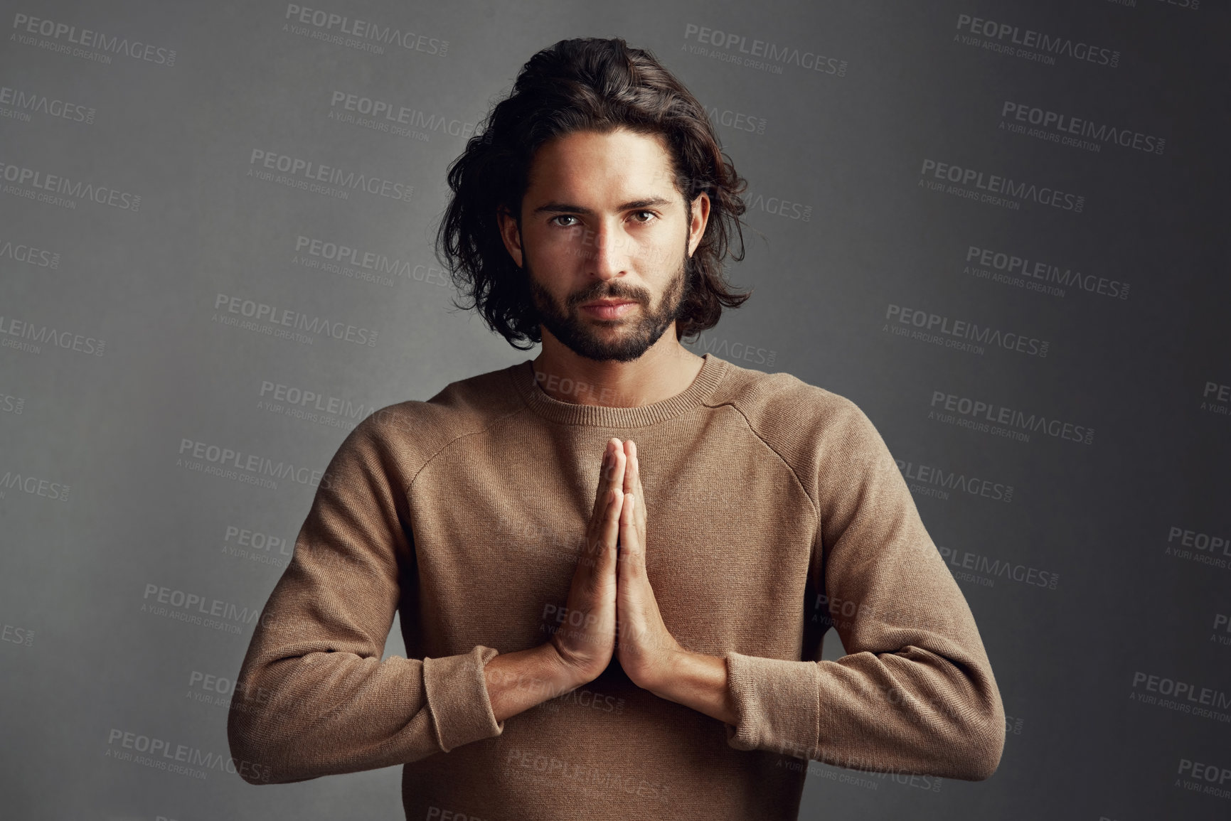 Buy stock photo Man, studio and hands for praying in portrait with respect, religion with gratitude for wellness. Male person, gray background and hope for spiritual zen or praise with kindness, forgiveness with god