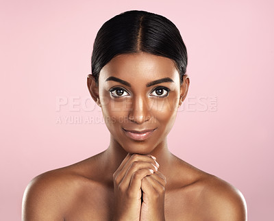 Buy stock photo Face portrait, skincare and woman in studio isolated on a pink background. Natural beauty, aesthetic and Indian female model with makeup, cosmetics and spa facial treatment for healthy skin glow.