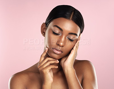 Buy stock photo Beauty, face and satisfaction for skincare with Indian woman in studio isolated on pink background for cosmetics. Aesthetic, natural and wellness with model at salon or spa for dermatology treatment