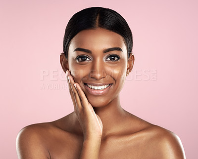 Buy stock photo Portrait, beauty and Indian woman with cosmetics, skincare or dermatology on pink studio background. Face, person or model with healthy skin, makeup or shine with vibrant glow or wellness with luxury
