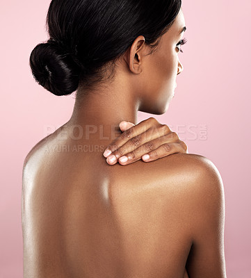 Buy stock photo Girl, studio and back with glow, skincare and cosmetics with satisfaction and confidence. Model, aesthetic or body care for natural, clean skin and detox for self love isolated on pink background 