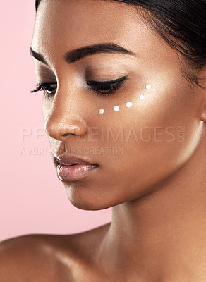 Buy stock photo Face, skincare cream and woman in studio isolated on a pink background. Dermatology, creme and Indian female model with cosmetics, sunscreen lotion or moisturizer product for healthy skin and beauty.