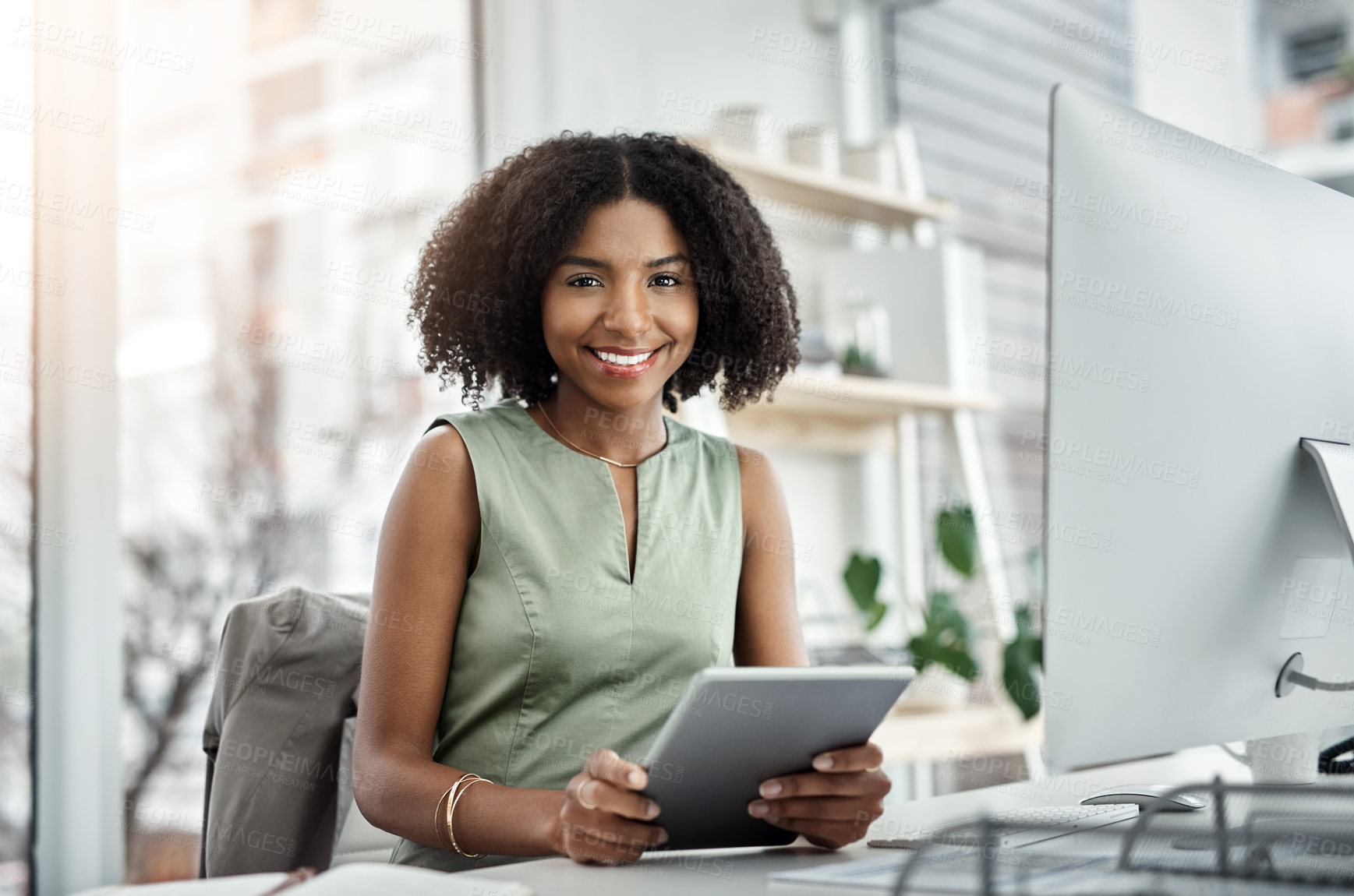 Buy stock photo Happy, portrait and black woman with tablet for business, research or data at office desk. Young African, female person or employee with smile on technology for browsing, communication or finance