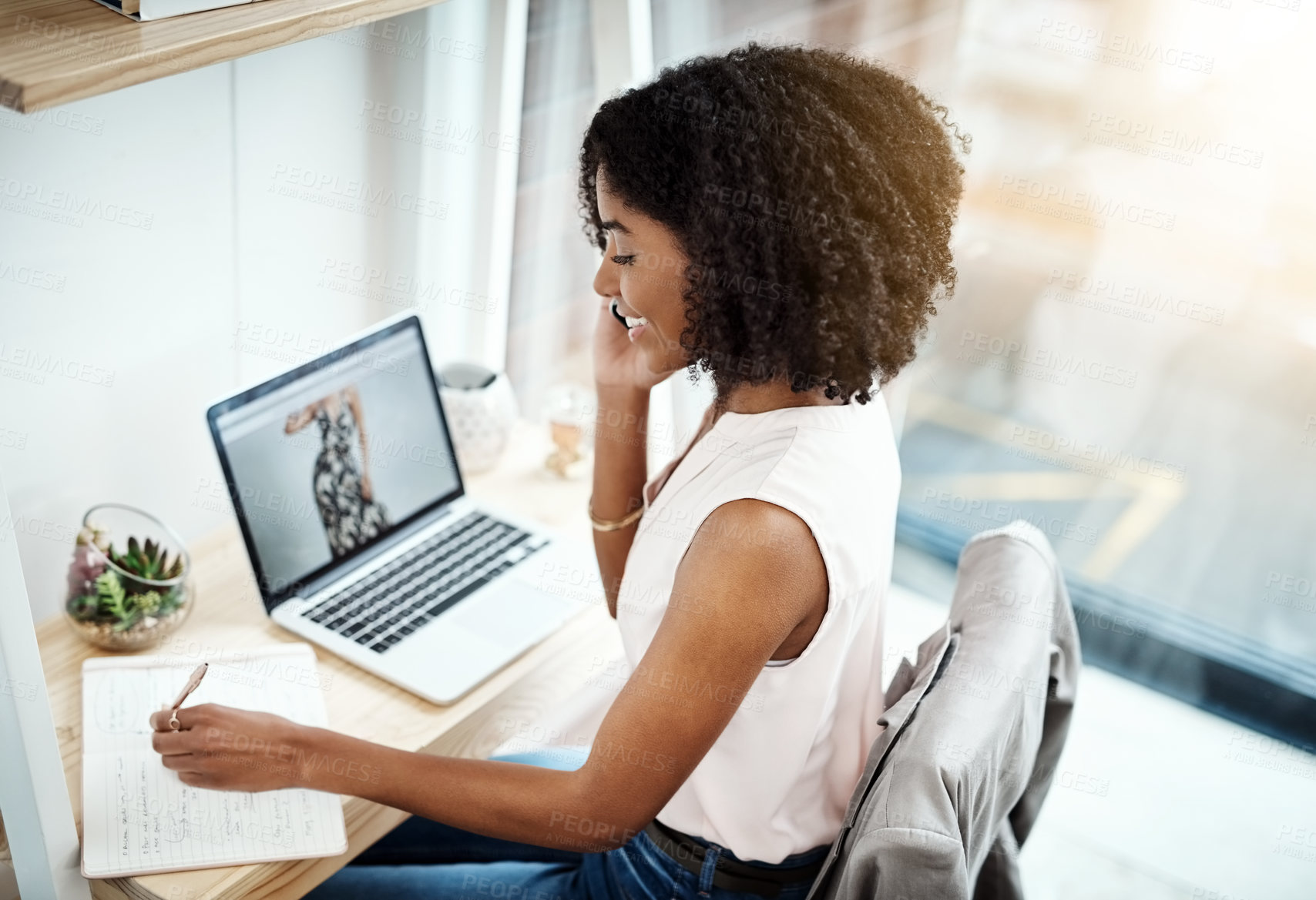 Buy stock photo Laptop, phone and fashion woman writing notes, planning or networking in e commerce, small business or online startup. Creative person talking on mobile voip, computer and notebook for clothes design