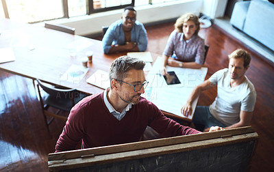 Buy stock photo Presentation, business and group in meeting at office for brainstorming, ideas and solution of sales growth. Above, team and speaker for finance, discussion and documents for feedback of profit goal