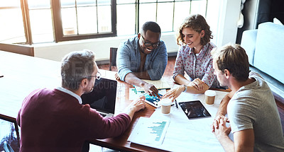 Buy stock photo Shot of a creative team having a brainstorming session in the boardroom