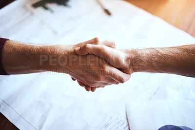 Buy stock photo Cropped shot of two unrecognizable businessmen shaking hands