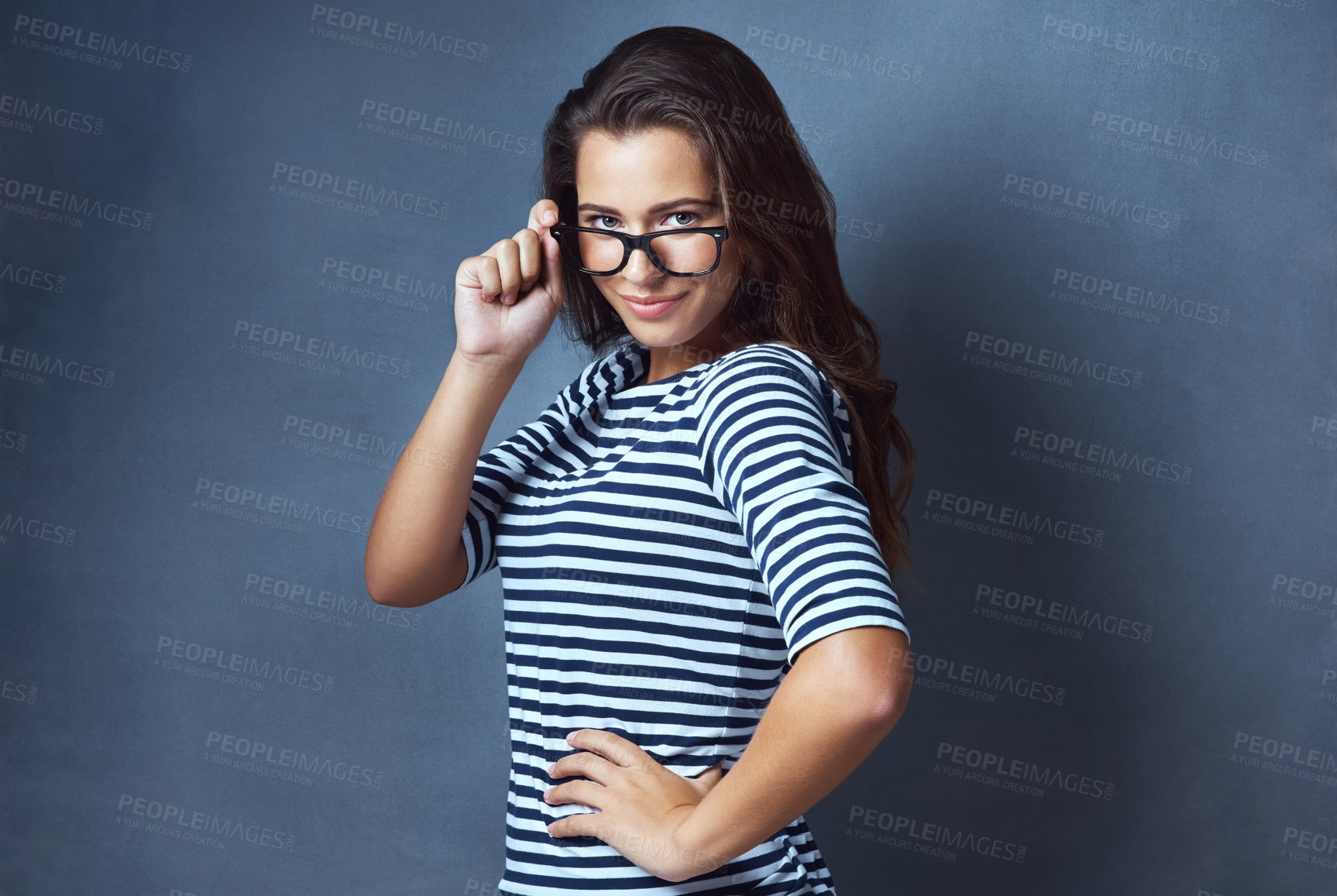 Buy stock photo Portrait, glasses and woman with happiness, clear vision and optometry on gray studio background. Face, person and model with eyewear, sight and looking with casual outfit, confidence and wellness