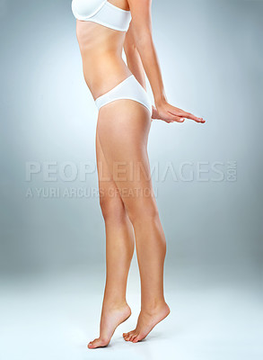 Buy stock photo Body, legs and underwear with woman in studio on gray background for health or wellness. Abdomen, beauty or fitness with profile of perfect model in bra and panties for diet or losing weight