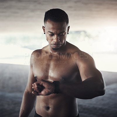 Buy stock photo Resting, time and exercise with black man looking at watch and outside for a fitness in parking lot. Workout, wellness and training with a male person, bodybuilder or boxer tracking his health