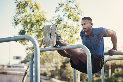 Buy stock photo Black man, bar and dips in exercise park for calisthenics workout for arm strength, wellness or sneakers. Male person, training and core fitness as muscle challenge with sports, equipment or athlete