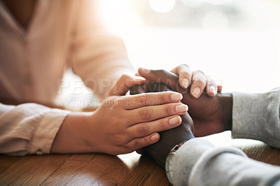 Buy stock photo Closeup of hands of couple holding in loving support of care and comfort after grieving loss. Kind friends express sympathy and trust for each other in sweet and caring gesture together
