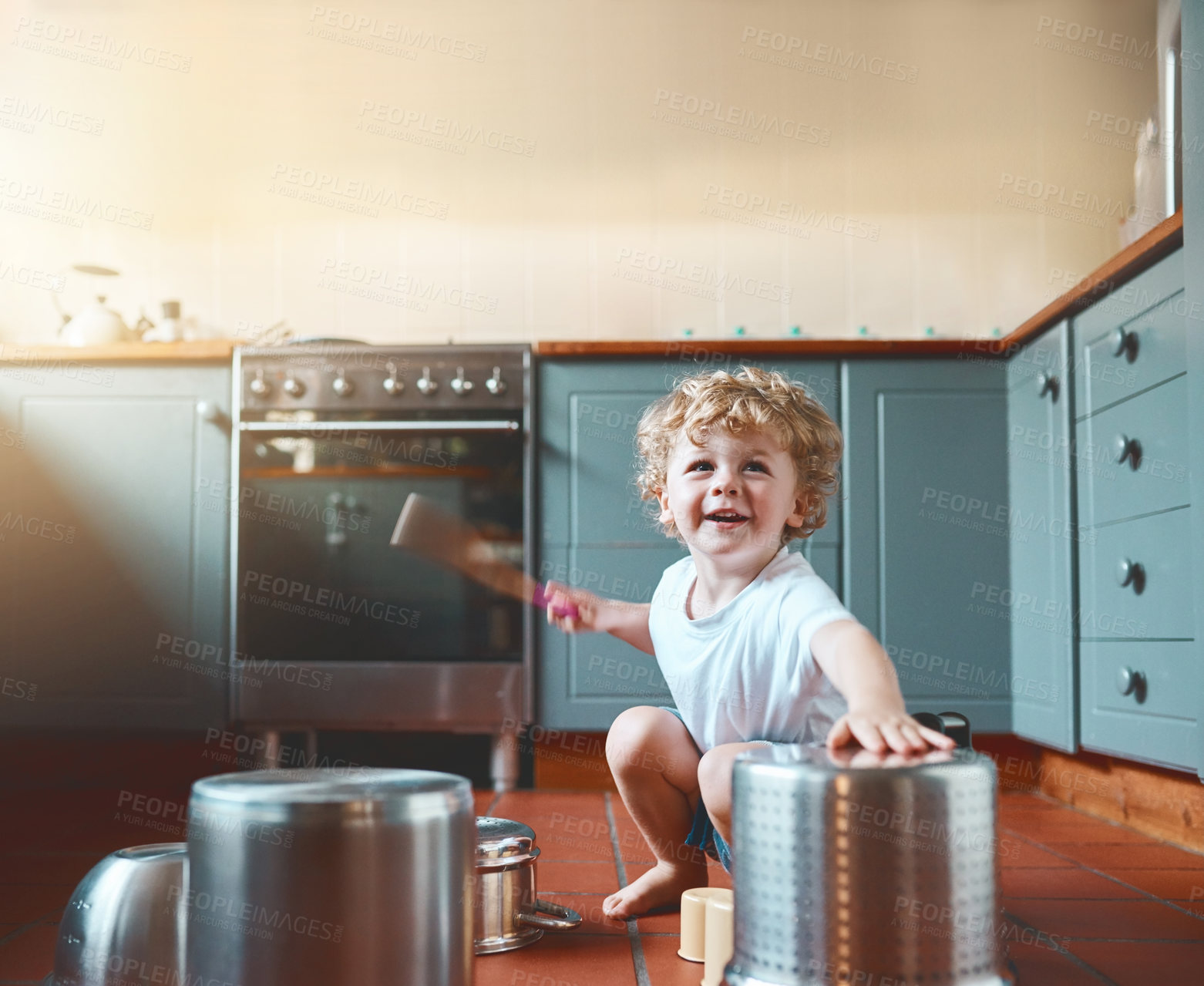 Buy stock photo Happy, boy and fun with pots in kitchen for creative drums, music or sound as musician of childhood learning. Smile, child and playing on fantasy instrument of noise game activity for development