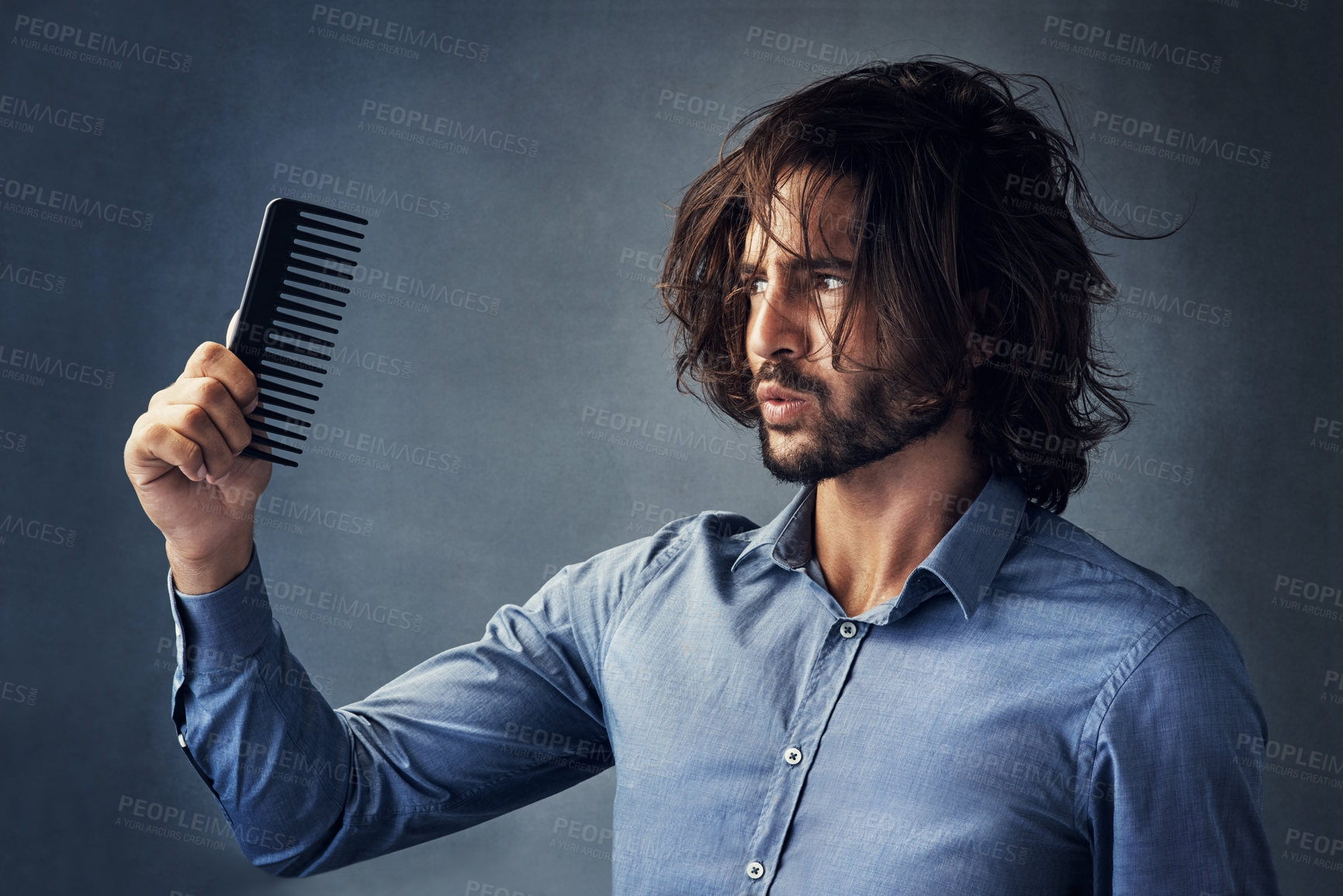 Buy stock photo Man, studio and hand with comb and hair loss and beauty on gray background. Stress, aging and wow for male person and grooming, alopecia and brush for surprise and wtf with messy hairstyle