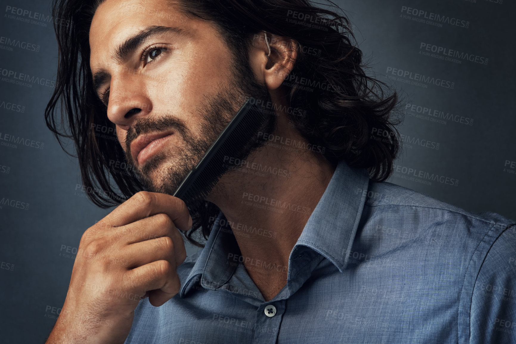 Buy stock photo Man, comb and beard in studio with grooming for facial wellness, morning routine and getting ready for work. Business professional, person and hair care maintenance for hygiene on gray background