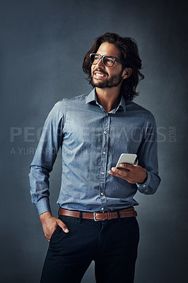 Buy stock photo Studio, business man and thinking with cellphone for chat, text message and online agreement with contact. Salesperson, glasses and reading on mobile app, social network and idea by gray background