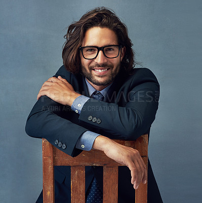 Buy stock photo Chair, fashion and portrait of business man in studio on gray wall background for professional career. Corporate, jacket and smile with happy employee in work suit for class, elegance or power