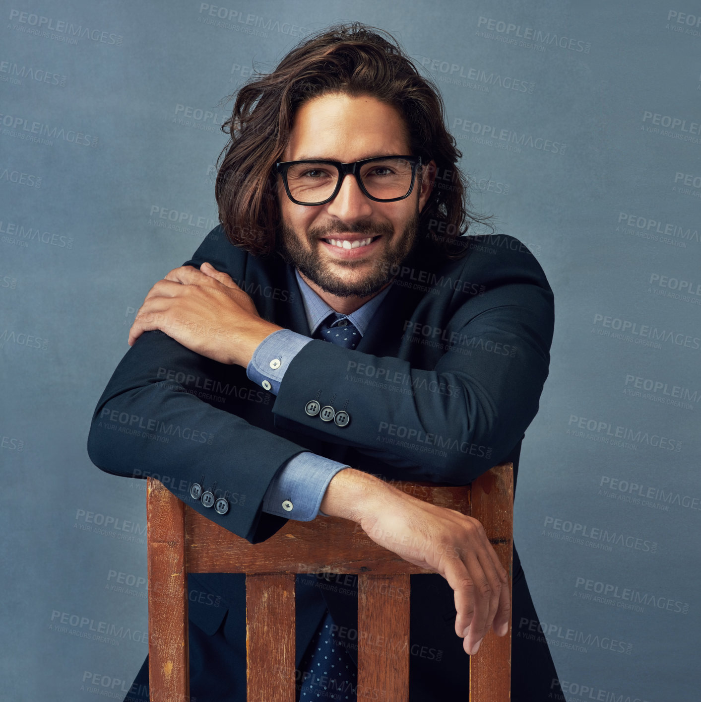 Buy stock photo Chair, fashion and portrait of business man in studio on gray wall background for professional career. Corporate, jacket and smile with happy employee in work suit for class, elegance or power