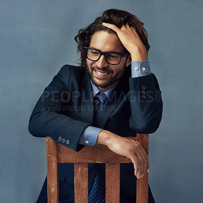 Buy stock photo Chair, fashion or suit with business man in studio on gray wall background for professional career. Corporate, happy or smile and confident employee in formal work outfit for class, elegance or power