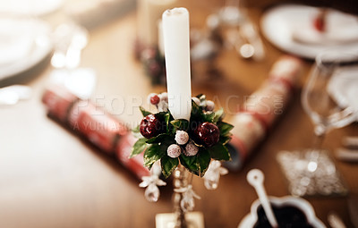 Buy stock photo Closeup shot of a candle on a table at Christmas