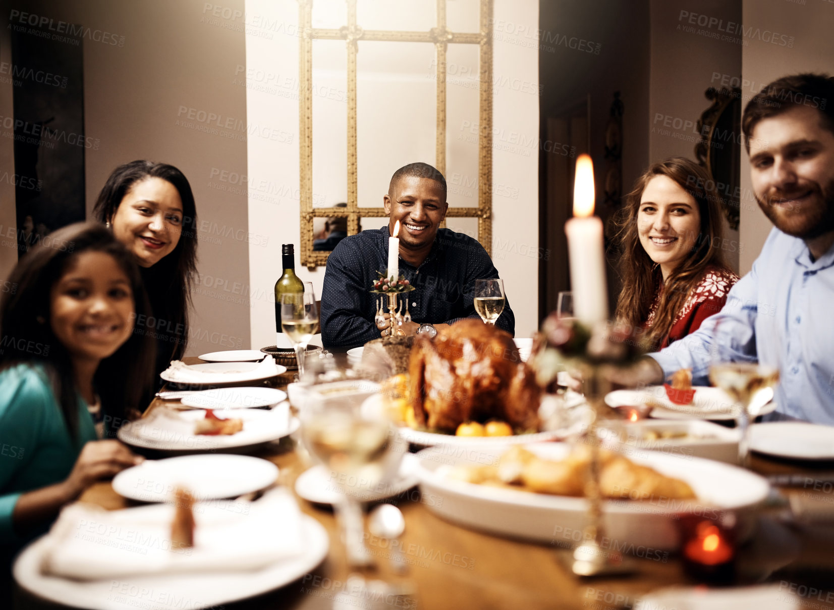 Buy stock photo Portrait of a happy family having Christmas lunch together at home