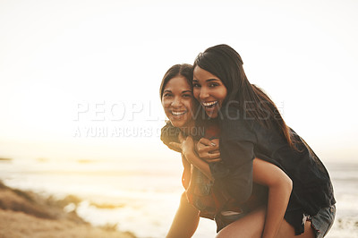 Buy stock photo Piggy back, beach and portrait of women for holiday, summer vacation and bonding on weekend. Travel, nature and happy people by ocean for adventure, fun and relax together by sea for friendship