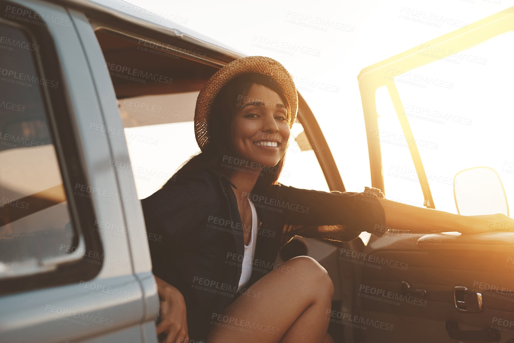 Buy stock photo Road trip, relax and portrait of woman with smile for outdoor summer adventure, sunset and travel break. Happy, person and vacation with hat by car door for sightseeing, holiday or tourism in Croatia