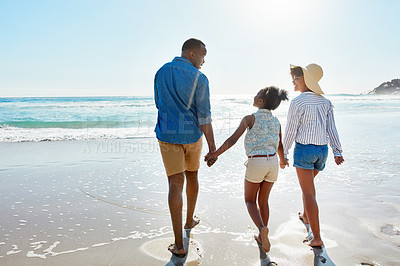 Buy stock photo Summer, ocean and black family on a walking on a tropical, beach and relaxing at the sea and enjoying the scenery. People, water and parents with daughter, child or kid with childhood freedom