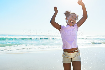 Buy stock photo Children, beach and fun with a black girl dancing alone on the sand in summer by the sea or ocean. Nature, kids and blue sky with a female child playing by the water while on holiday or vacation
