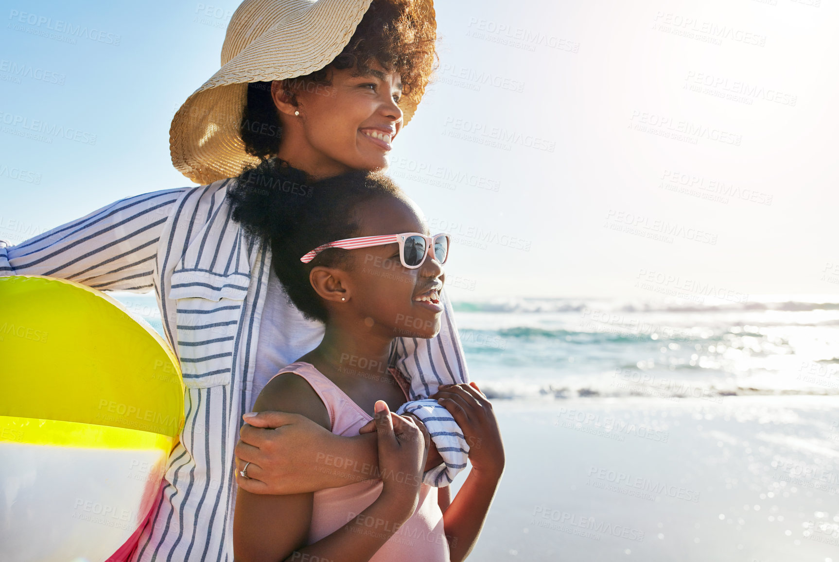 Buy stock photo African mom, girl and hug on beach for holiday, vacation and travel together with outdoor bonding for mothers day. Excited family, woman and child with fashion, style and games for weekend away