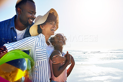 Buy stock photo Black family, children or beach with a mother, father and daughter carrying a ball, walking on sand by the sea. Love, nature and ocean with a man, woman and girl child playing on the coast in summer