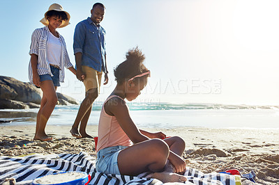 Buy stock photo Fun, relax and girl at the beach with parents for holiday, summer and travel in Portugal. Freedom, playful and black family at the ocean for a vacation, fresh air and coastal trip at the sea