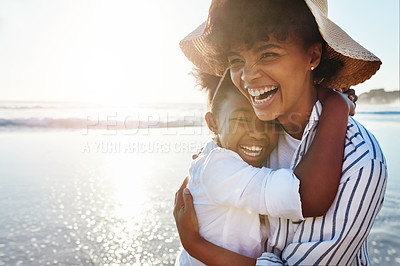 Buy stock photo Family, kids and beach with a mother and daughter laughing or joking together in the ocean or sea. Love, children and coast with a black woman and girl having fun while bonding by the water in nature