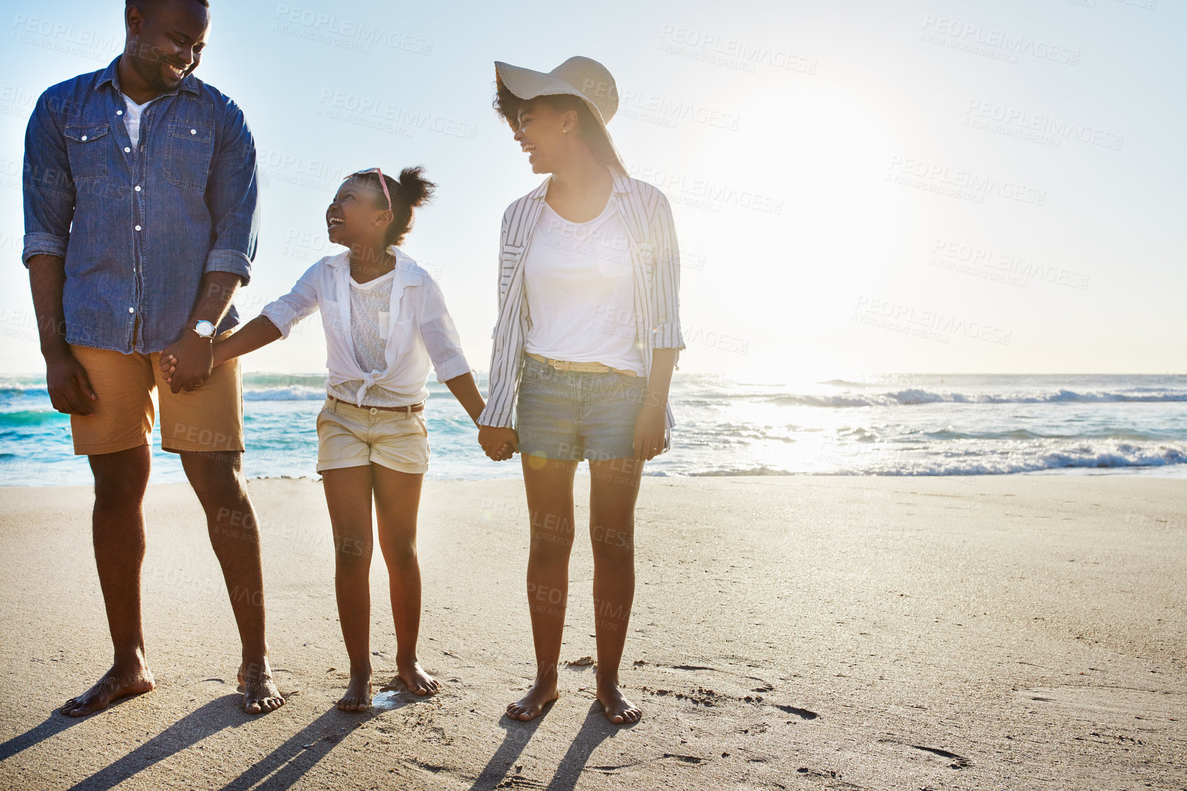 Buy stock photo Black family, mother and father with girl, beach and vacation for summer, weekend break and bonding. Love, parents and daughter on seaside holiday, sand and happiness for traveling and holding hands