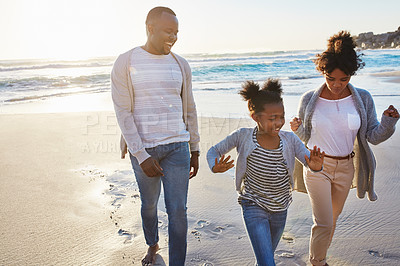 Buy stock photo Black family, parents and girl child at beach, smile and walk with bonding, connection and people in sunshine. Father, mother and daughter with care, love or excited by ocean with memory on vacation