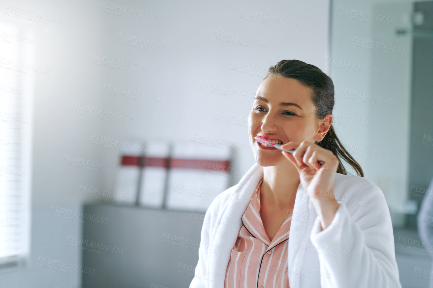 Buy stock photo Brushing teeth, morning and mirror with woman in bathroom for oral hygiene, cleaning and dental. Self care, wellness and toothbrush with person at home for gum treatment, toothpaste and health